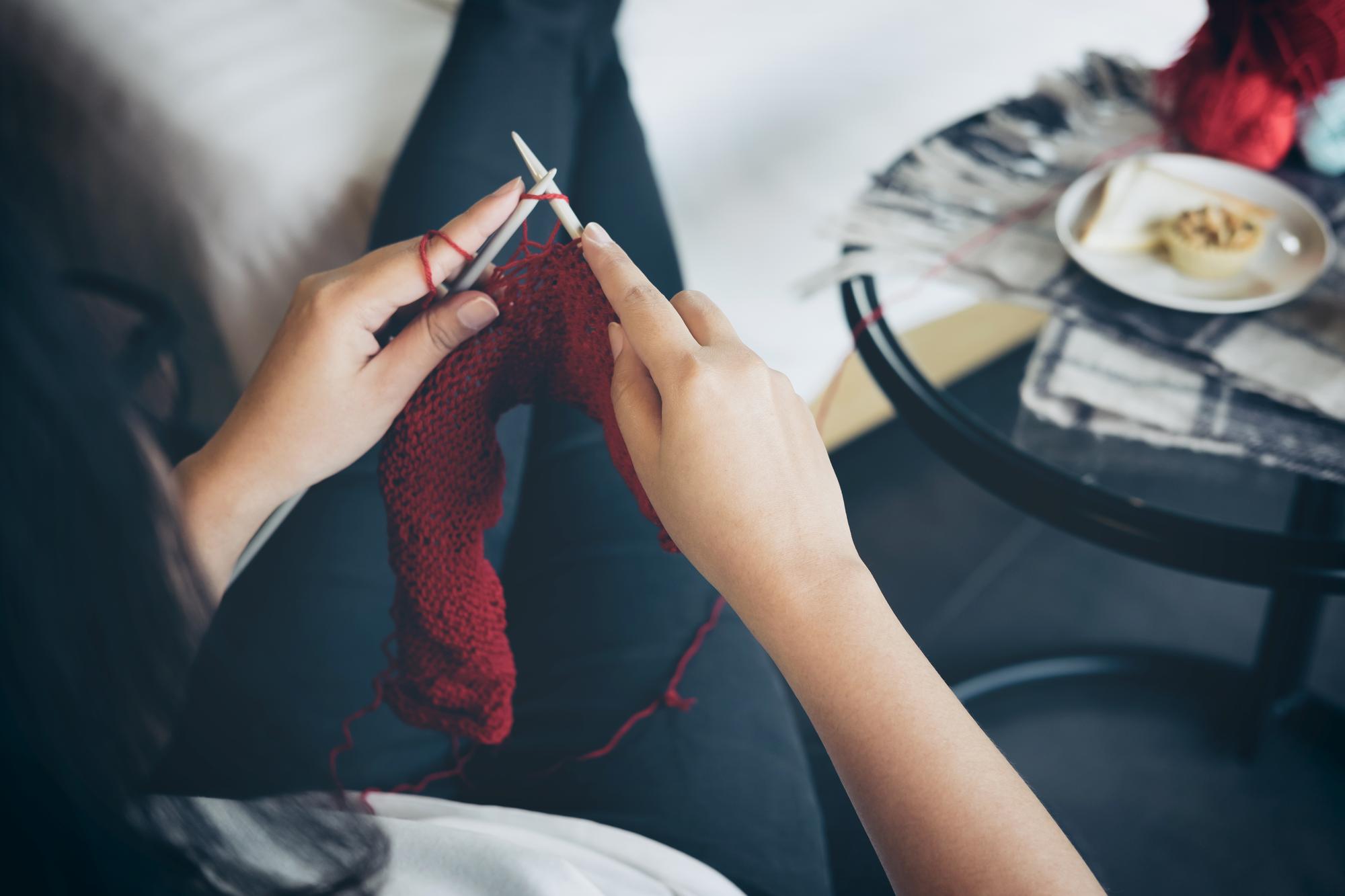 studio hands at work with needle and thread